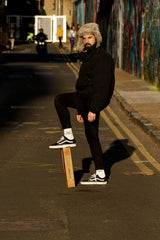 two pairs of dont follow me i am lost too written white and black socks