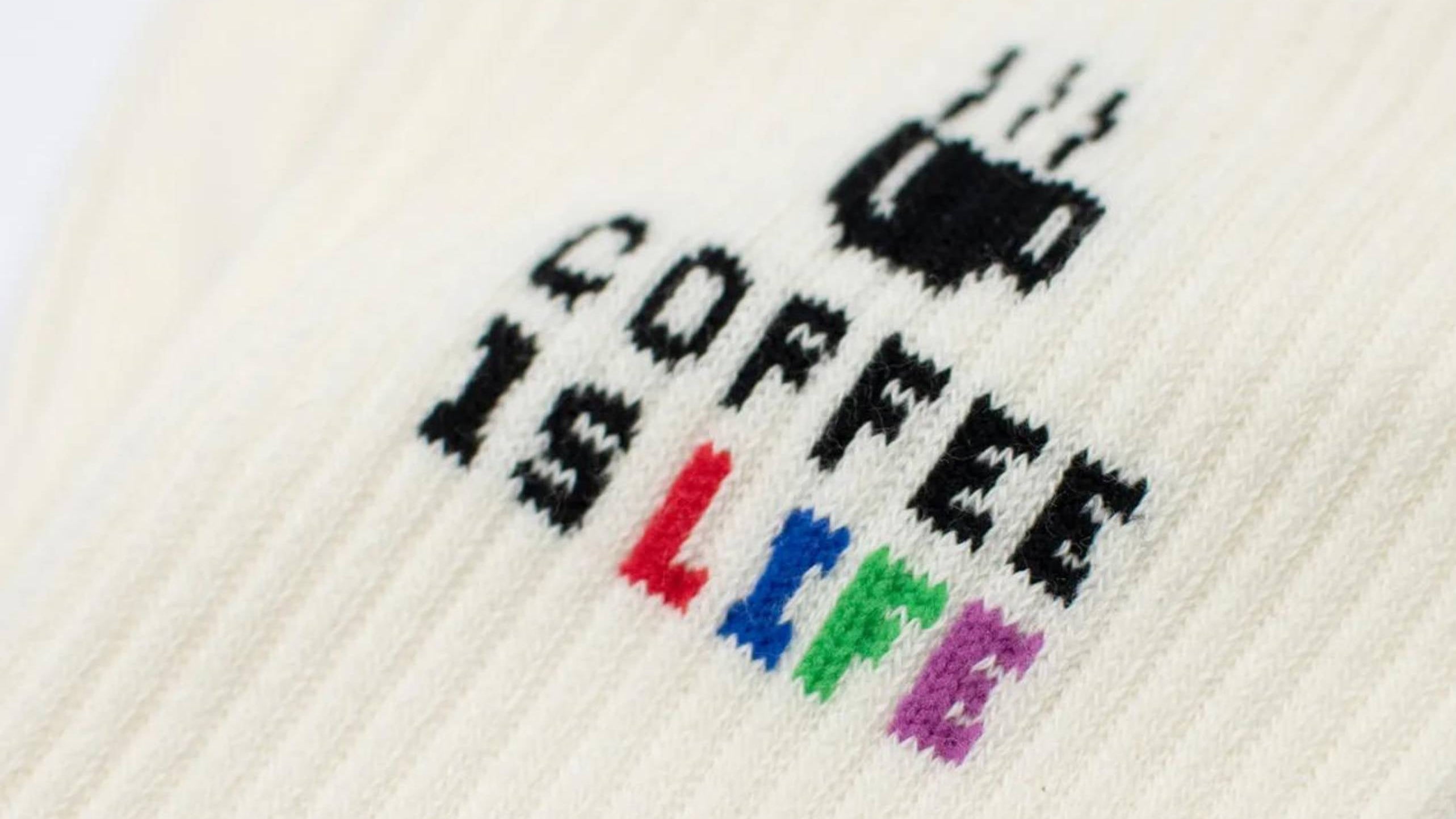 Close view of coffee is life socks