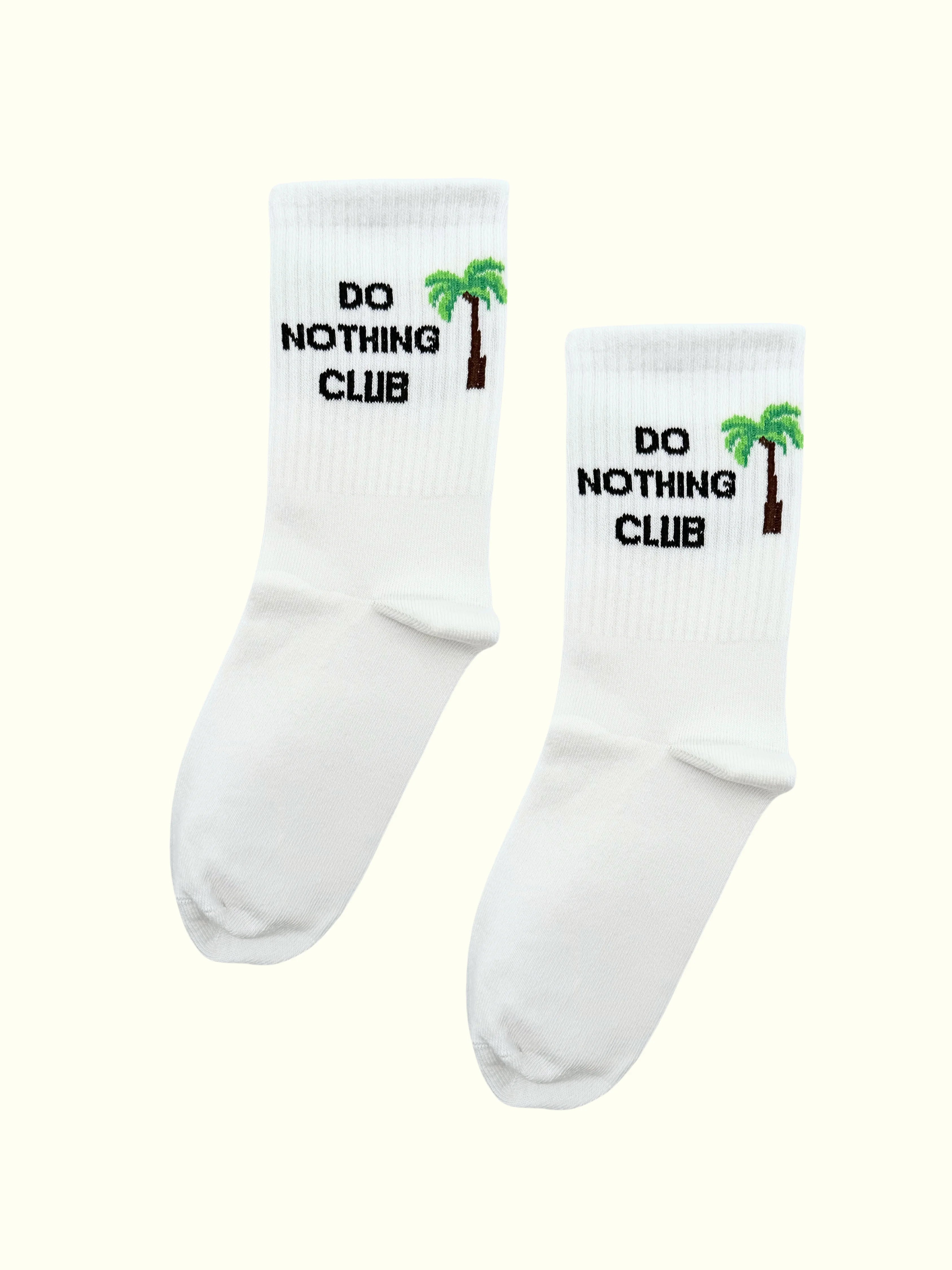 A pair of do nothing club white socks