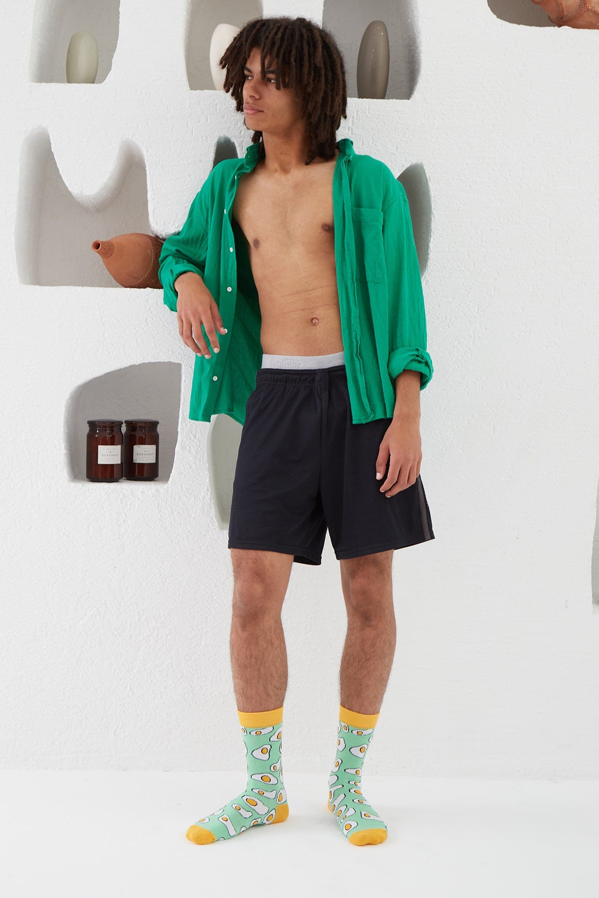 A model wearing light green egg socks