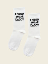 A pair of I need sugar daddy socks