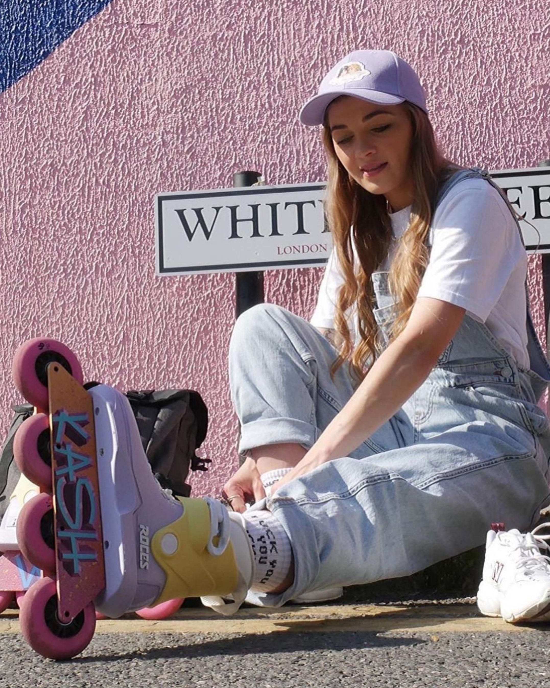 A female skater wears Fuck You You Fucking Fuck Socks