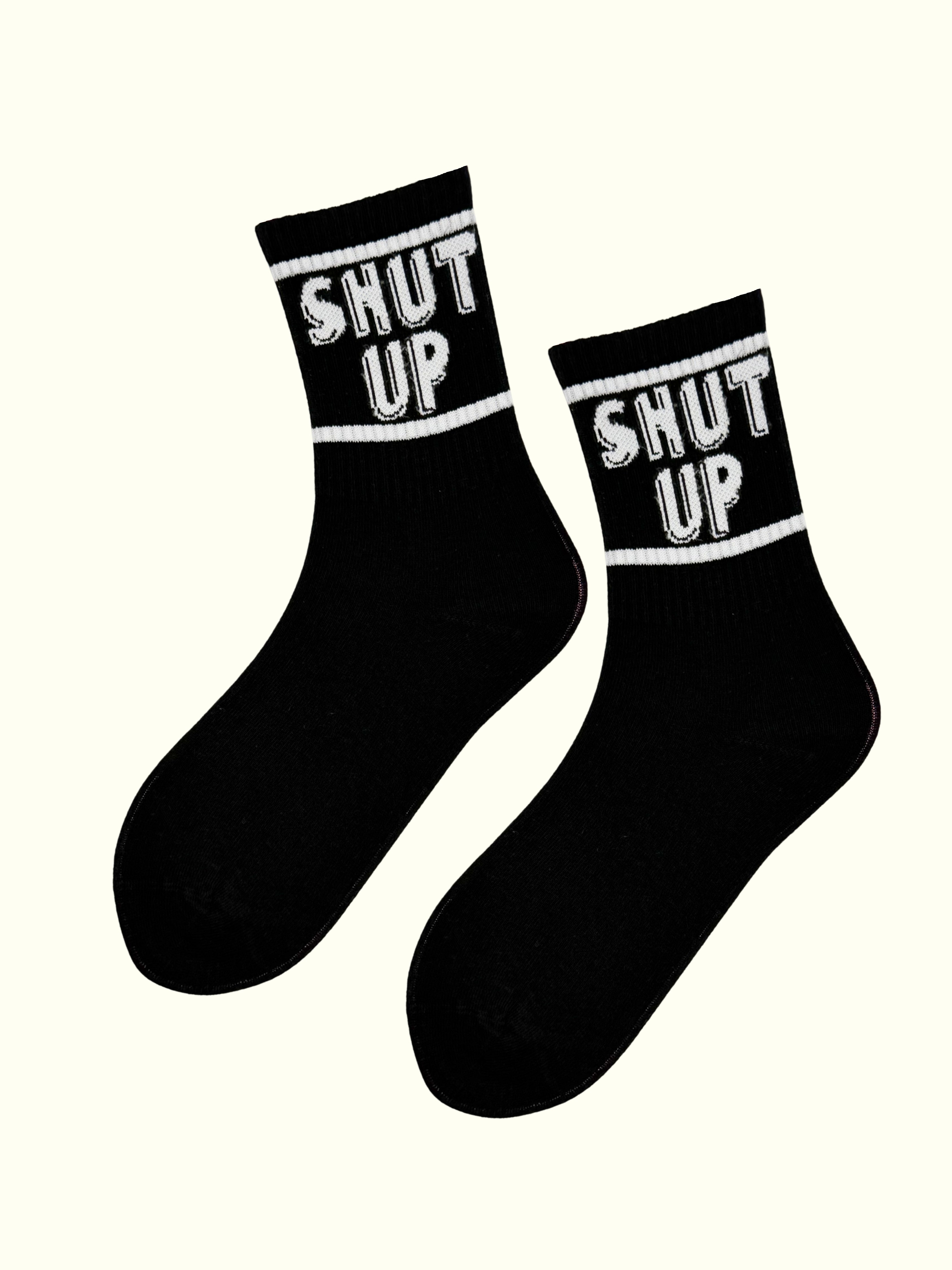 A pair of black shut up socks